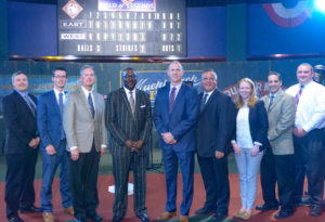 Photo Caption: Bob Kendrick, NLBM president, and executives from Hy-Vee teamed to announce the museum’s Hall of Game Class of 2019 on Tuesday. The Hall of Game, presented by Hy-Vee is planned for 8 pm, Saturday, June 29 at the Gem Theater. Hy-Vee has been the presenting sponsor of the Hall of Game since the event’s inception in 2014. Pictured l-r: Rick Moore (Independence #1), Luke Long (Olathe #1), Jeff Sesker (Lee’s Summit #2), Bob Kendrick, Drew Holmes (SW Senior Regional VP), Marty Streit (Independence #2), Marcie Casey (Shawnee), Russ Johnson (Overland Park #1), Chris Price (Lenexa). Hy-Vee Group